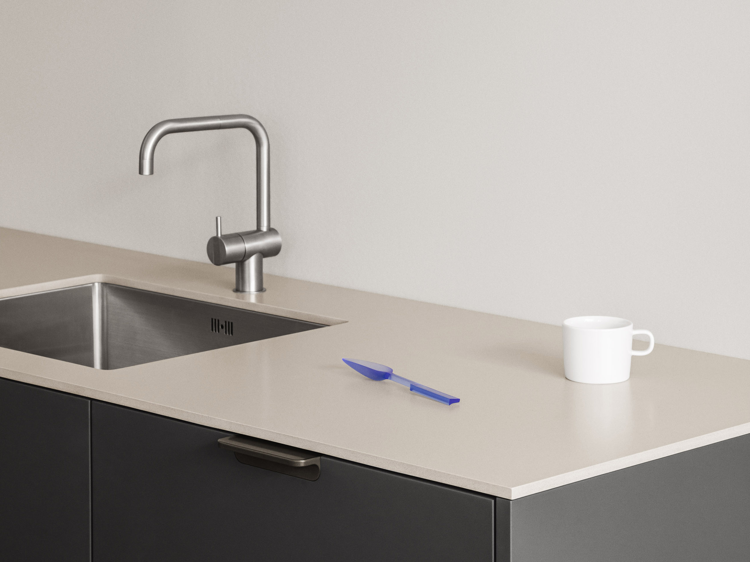 Kitchen worktop, steel sink and faucet